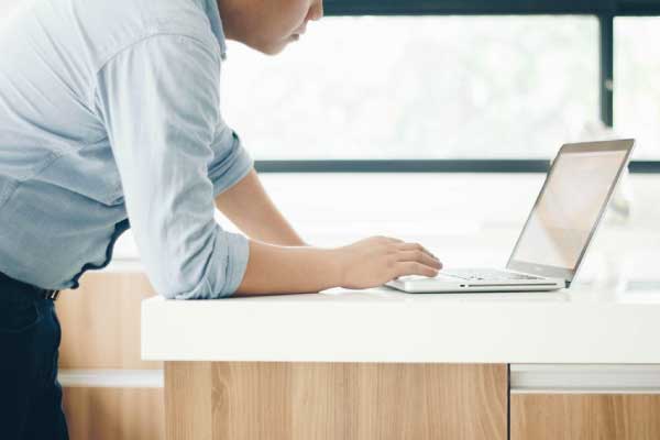 man using laptop